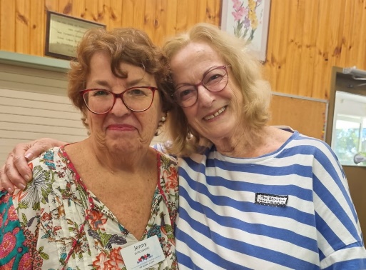 Two women posing for a picture

AI-generated content may be incorrect.